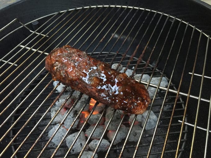 Chili Rubbed Pork Tenderloin with Apricot Glaze cooking on the grill