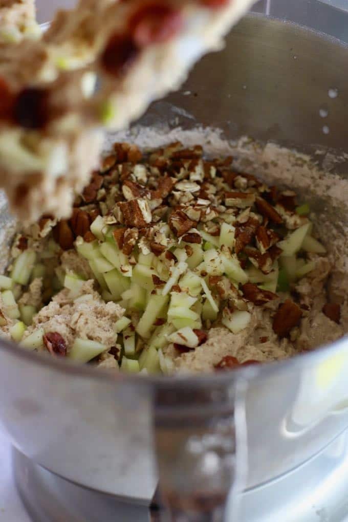 Adding apples, pecans and cranberries to the batter for Easy Apple Cranberry Muffins
