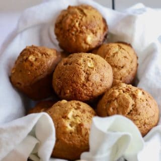 Easy Apple Cranberry Muffins in a basket and ready to eat