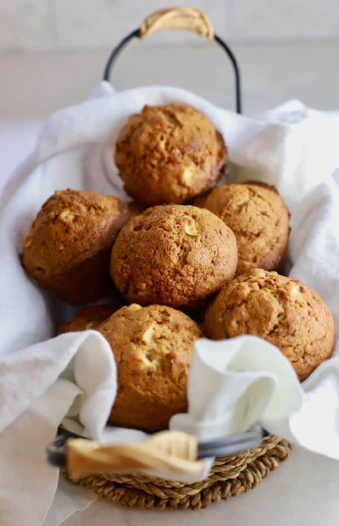 Easy Apple Cranberry Muffins in a basket and ready to eat