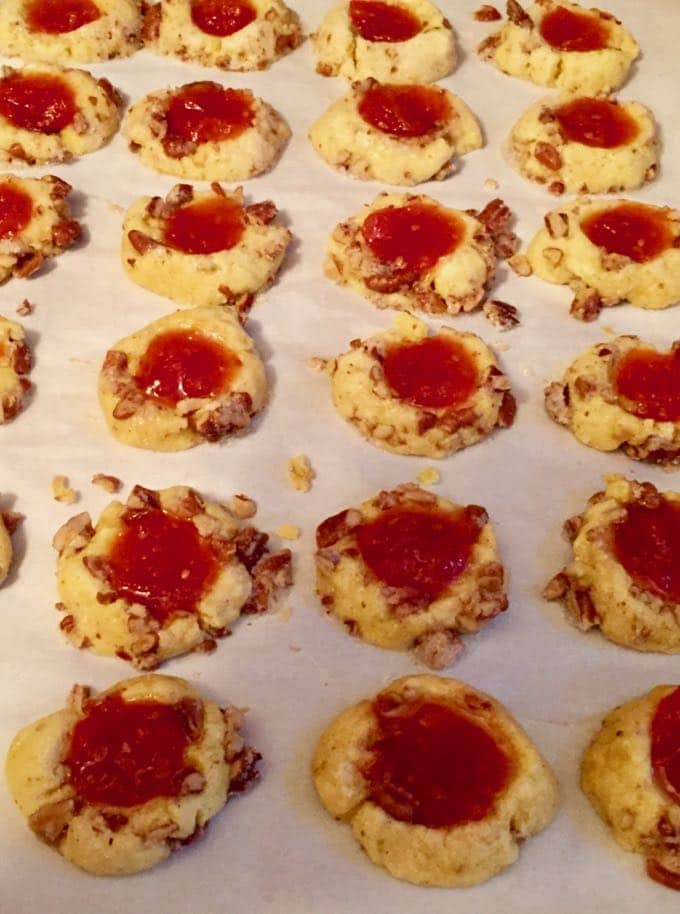 Cornmeal Cookies with Tomato Jam on a baking sheet