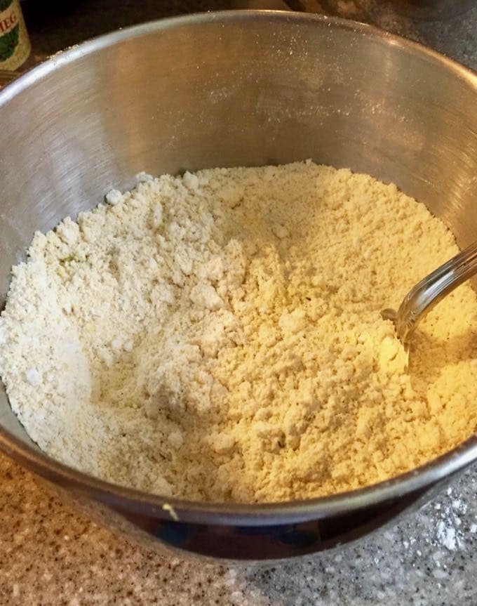 Mixing dry ingredients for Cornmeal Cookies with Tomato Jam