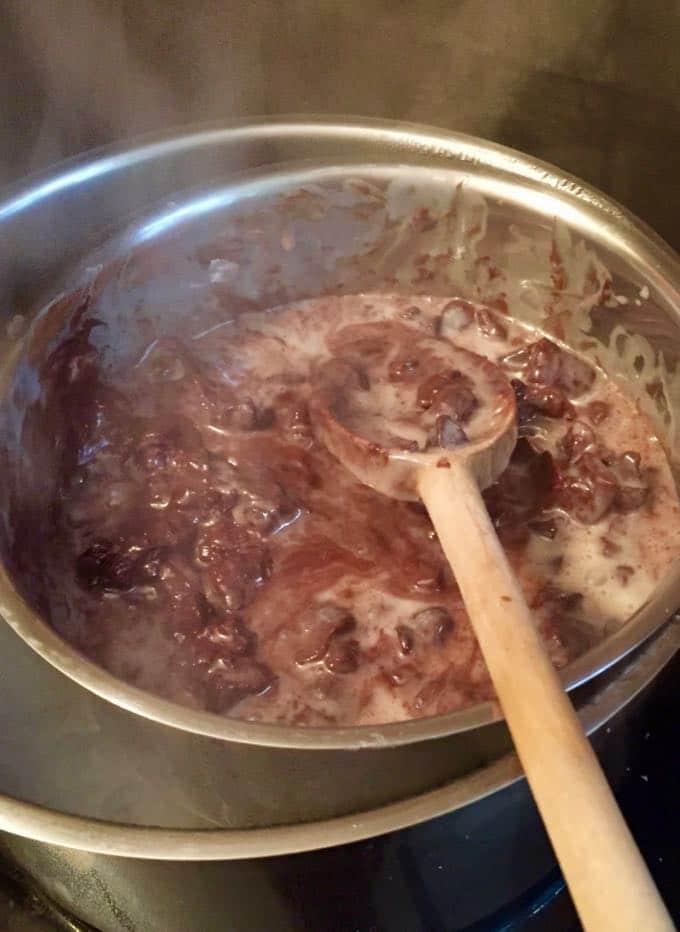 Melting chocolate in a double boiler to make Easy Chocolate Fudge