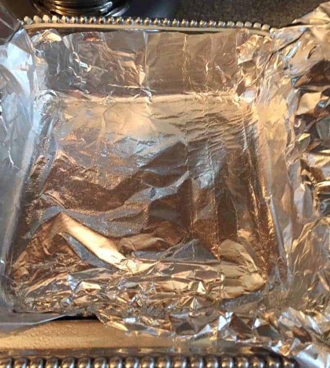 Lining a pan with aluminum foil to make Easy Chocolate Fudge