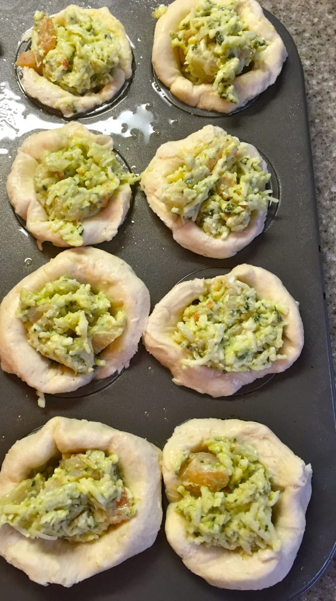 Shrimp Puff Appetizers in a muffin tin ready to bake