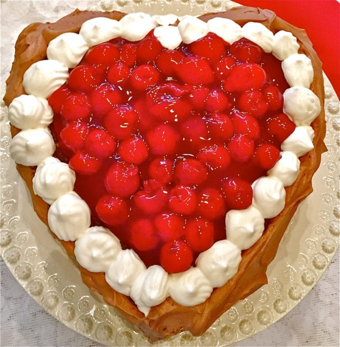 Chocolate Cherry Valentine Torte baked in the shape of a heart with cherries in the middle