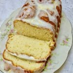 Southern Style Limoncello Cake sliced on a China platter.