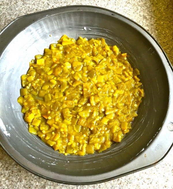 Chopped chilies in a 9-inch pie pan.