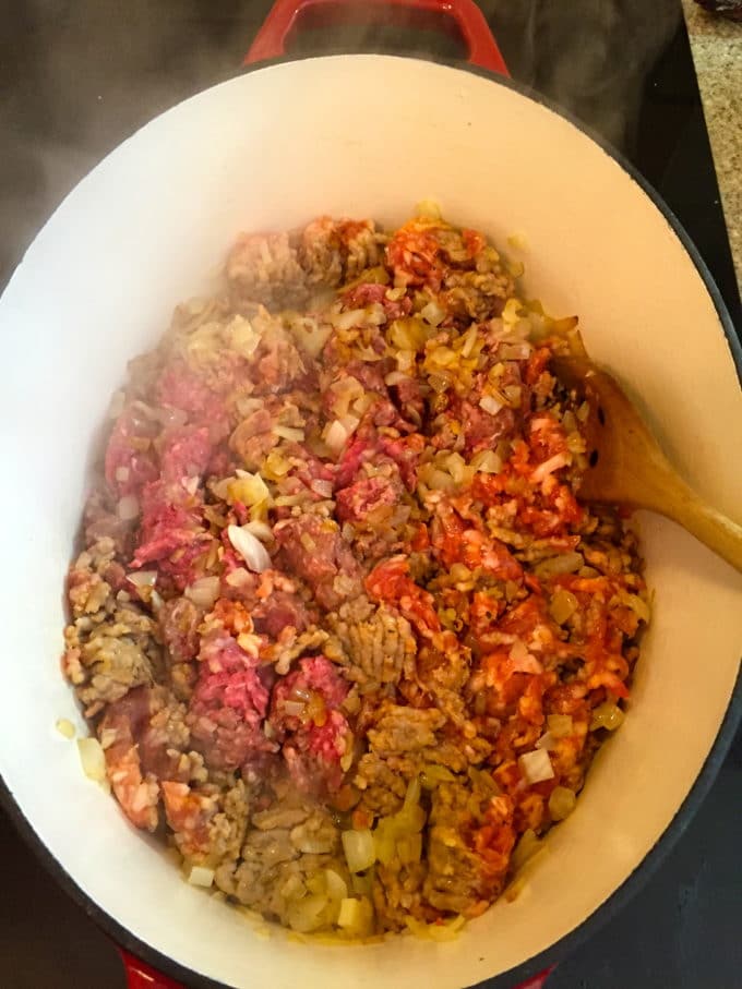 Sautéing sausage and hamburger in a dutch oven for Easy Make Ahead Baked Ziti 