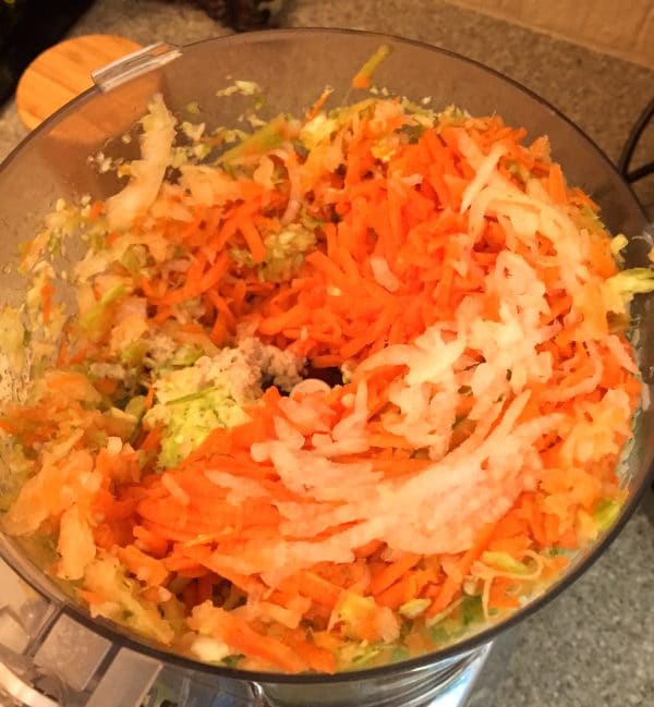 The vegetable filling shredded in a food processor.