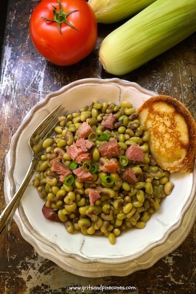 Southern Pink Lady Peas or Pink-Eyed Peas are a true summer Southern delicacy and delicious when served with a slice of cornbread or hoecakes and a few slices of fresh summer tomatoes. Try them today!