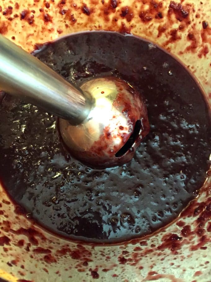 Using an immersion blender to make dark cherry sauce for Grilled Pork Tenderloin with Dark Cherry Sauce