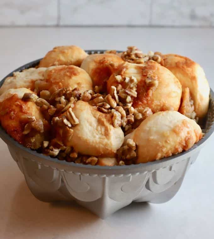 Yeast dough rolls in a bundt pan ready to bake in the oven.