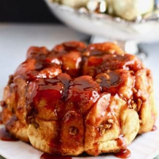 Butterscotch pecan monkey bread on a white plate.