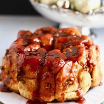 Butterscotch pecan monkey bread on a white plate.