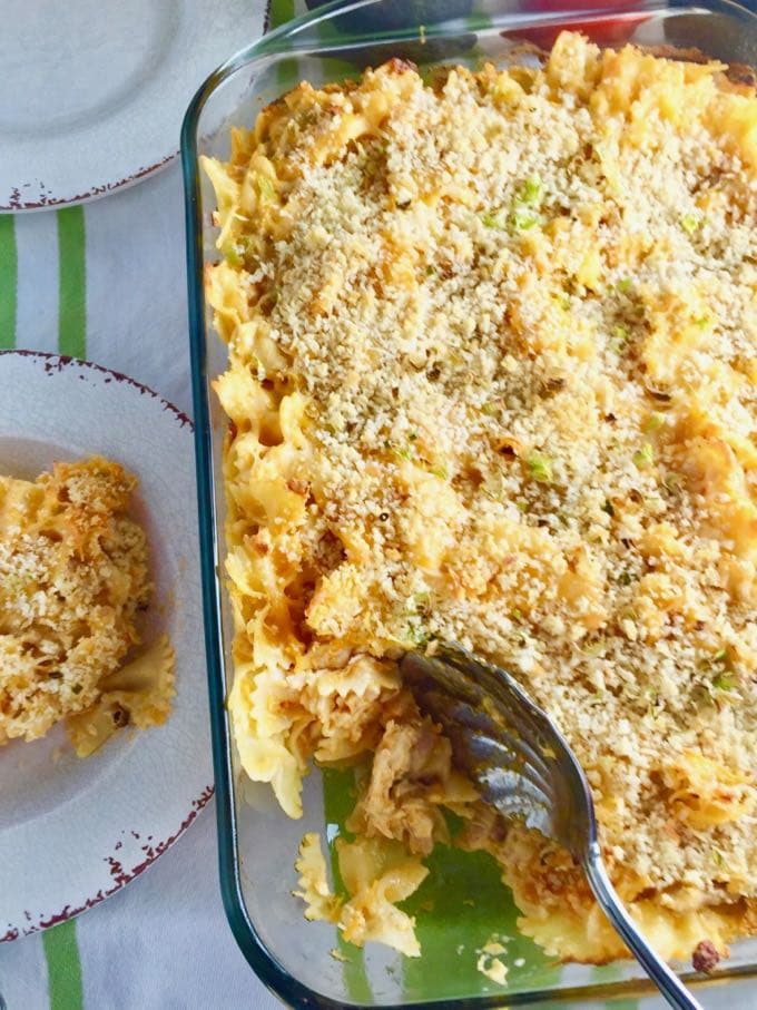 Buffalo Chicken Mac and Cheese on a green and white striped tablecloth