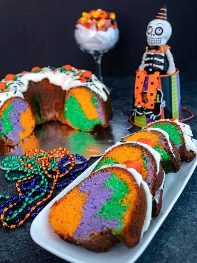 Halloween Surprise Bundt Cake made with halloween colors and candy.
