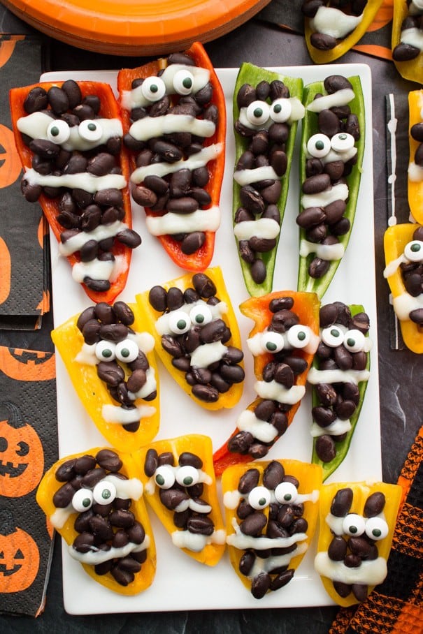 Halloween Mummy Peppers Stuffed with black beans and cheese.