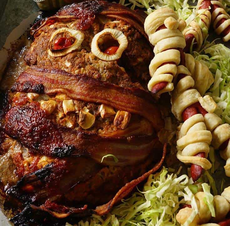 Meatloaf decorated to look like a mummy for Halloween. 