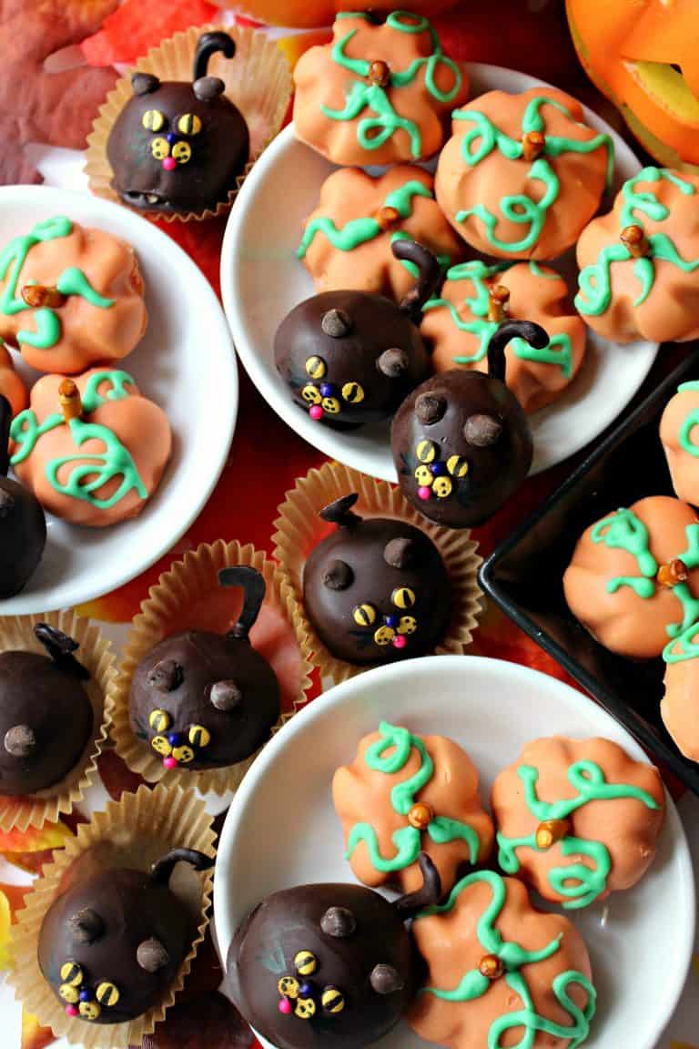 Peanut Butter Balls in the shapes of pumpkins and cats for Halloween. 