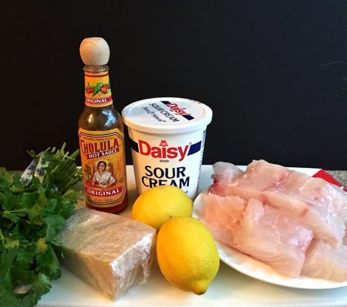 Easy Baked Parmesan Grouper Fillets ingredients including sour cream, parmesan cheese and grouper.