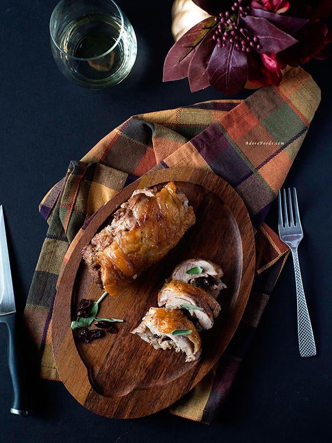 Roasted turkey thighs stuffed with cranberries and sausage.