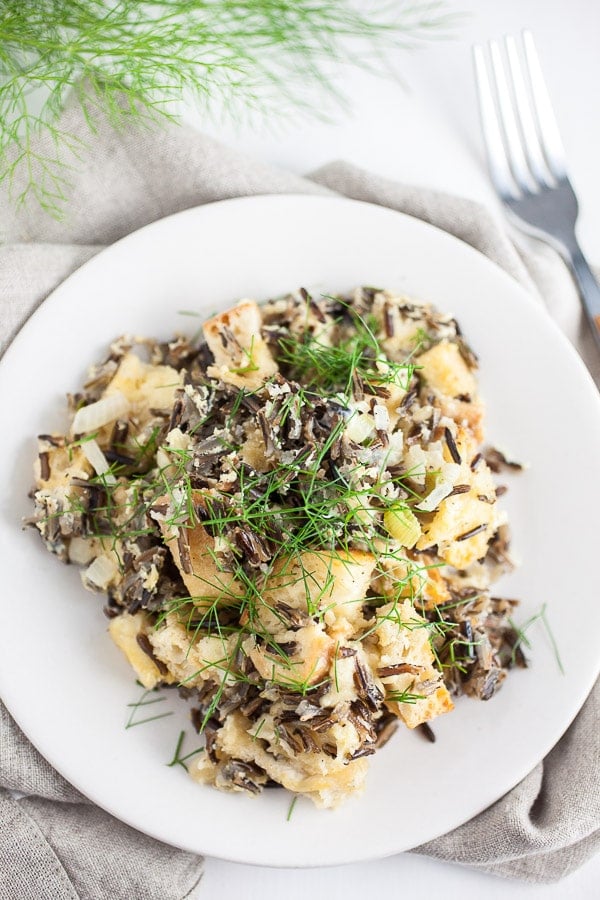 A plate full of wild rice and fennel stuffing. 