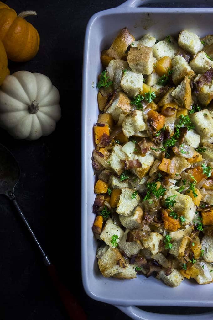 Butternut Squash Stuffing in a glass rectangular baking dish. 