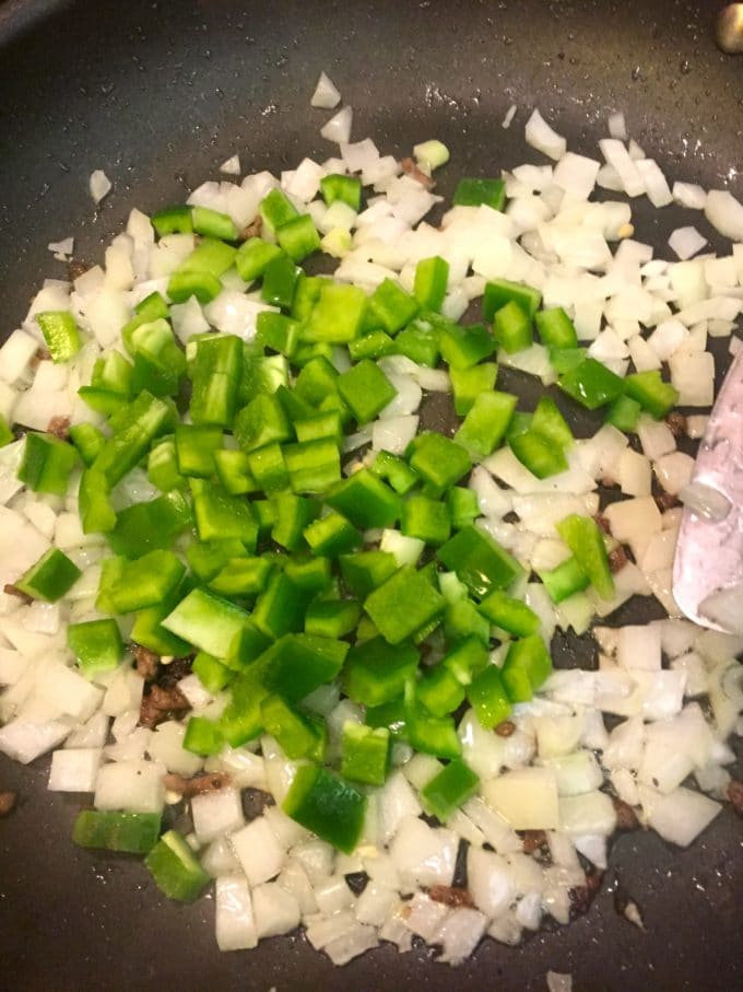 Cooking bell pepper and onions for Beef and Tomato Skillet with Polenta