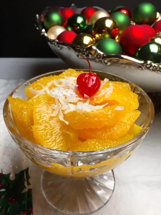 A bowl of Old Fashioned Southern Ambrosia with orange segments and coconut