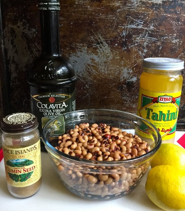 Black-Eyed Pea Hummus ingredients including cooked black-eyed peas and tahini.