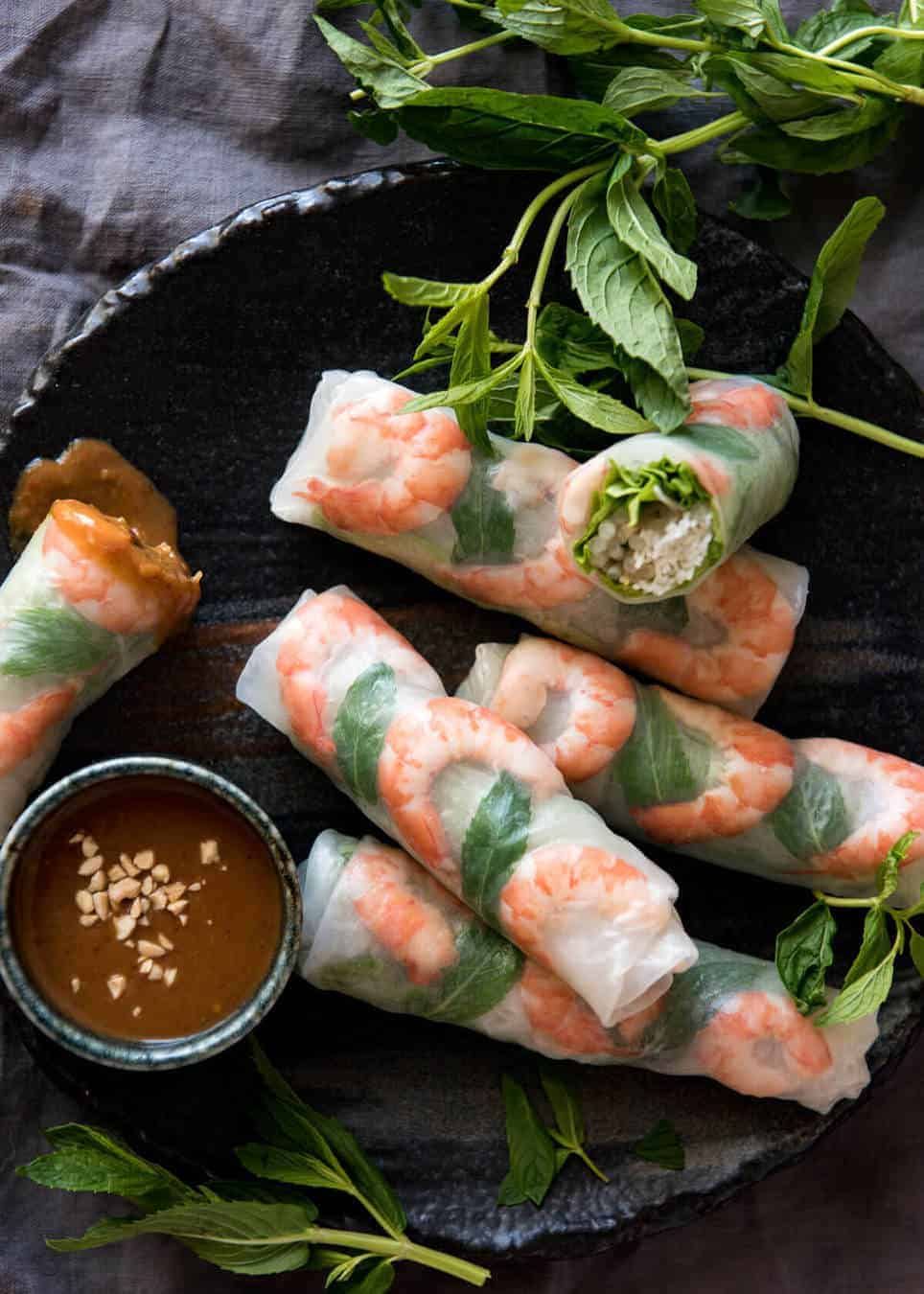 Vietnamese rice paper rolls with shrimp on a serving platter. 