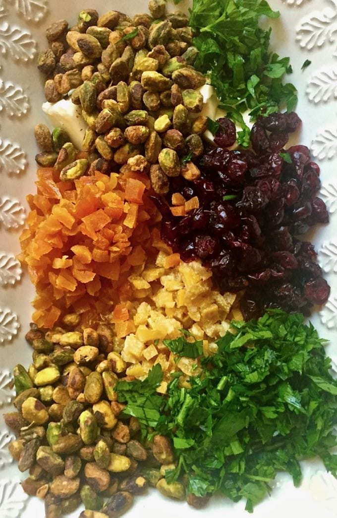 Chopped apricots, cranberries, pistachios, lemon, and parsley for Pearl Couscous with Preserved Lemon