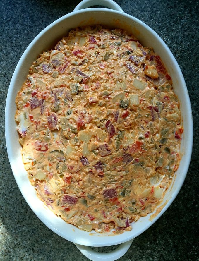 Dip in a baking dish ready to be baked in the oven.