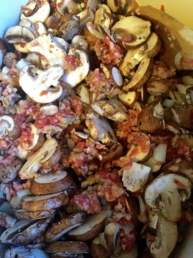 Cooking mushrooms, sausage and onions in a skillet for Easy Baked Spaghetti Pie Casserole