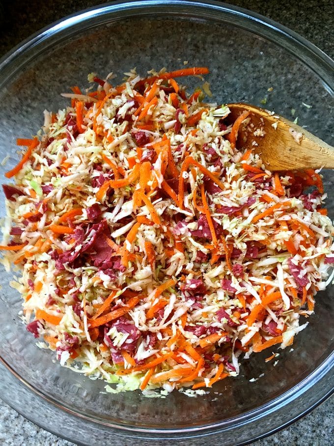 Mixing the ingredients in a bowl for Corned-Beef-and-Cabbage-Egg-Rolls.