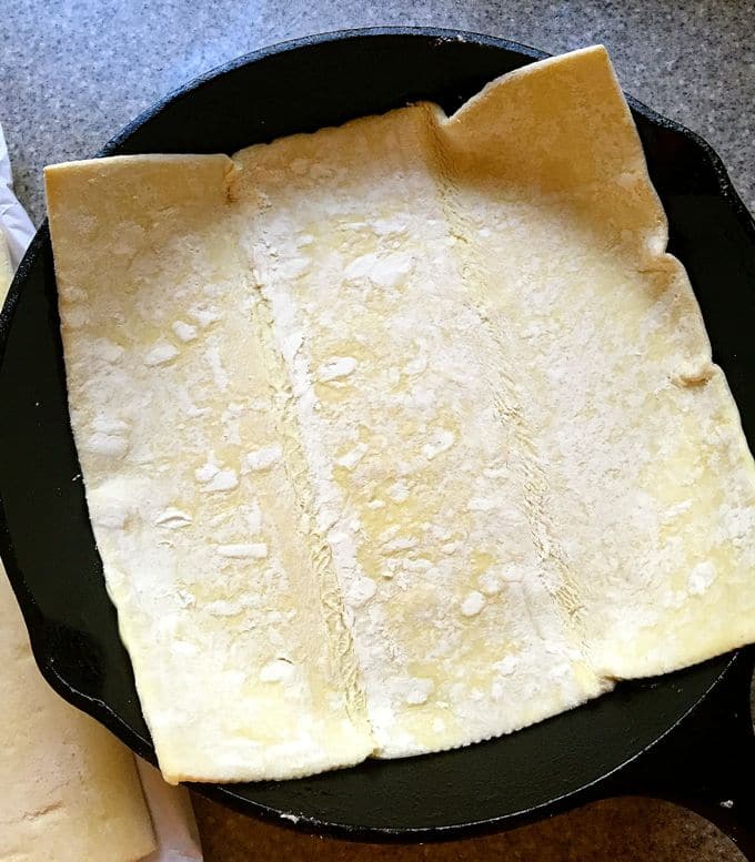 one puff pastry in a cast iron skillet.