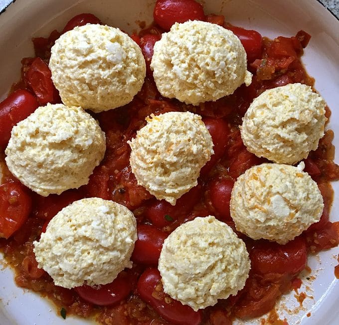 Tomato Cobbler with Cornbread-Cheddar Biscuits ready for the oven