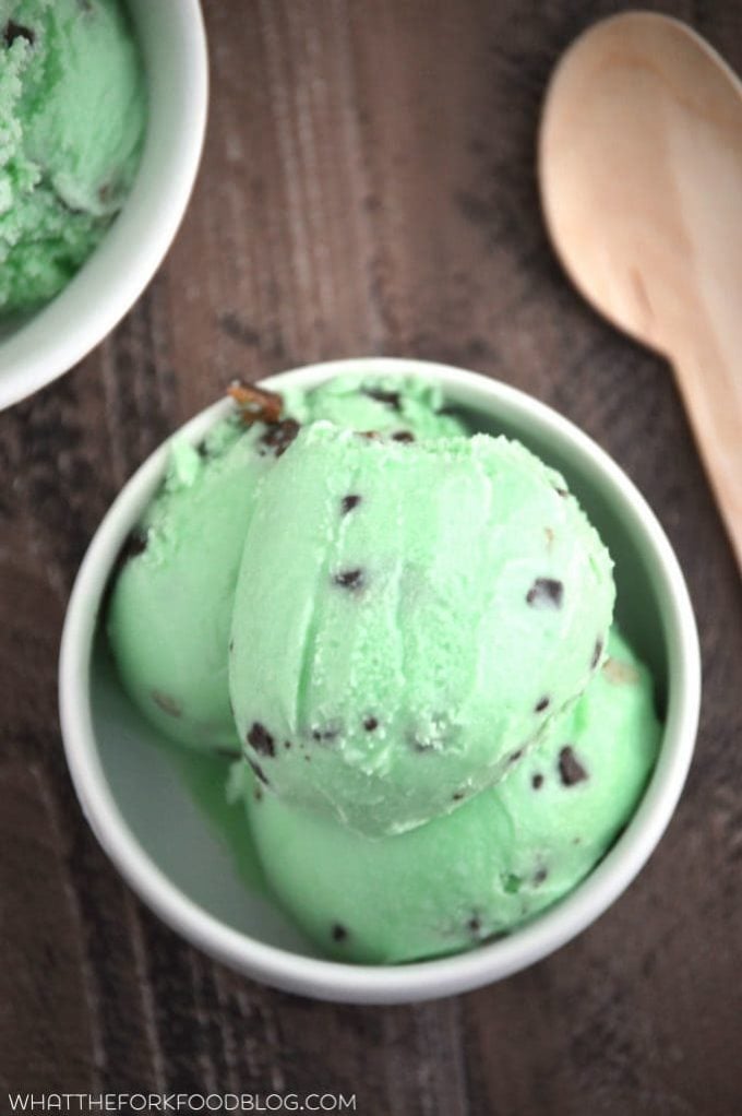 Scoops of Andes Mint Chip Ice Cream in two white bowl. 