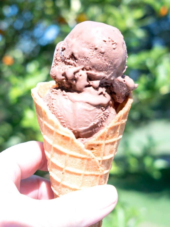 Several scoops of Triple Chocolate Ice Cream in a homemade waffle cone.