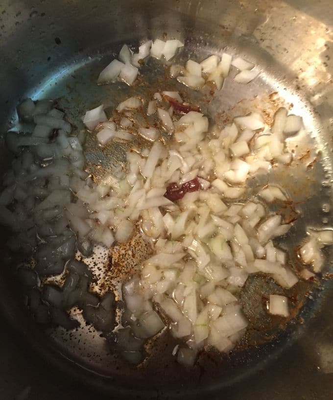 Cooking onion and garlic in a saucepan.