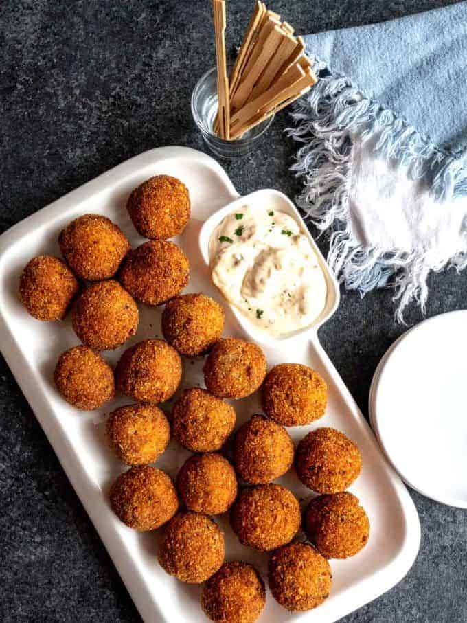 Cajun Pork Boulettes on a white serving plate.