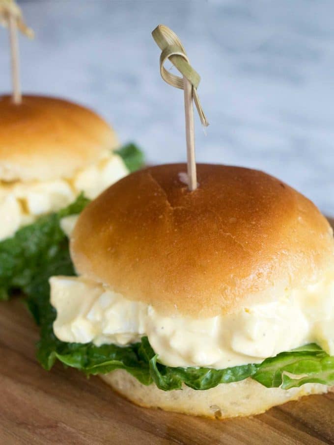  Two Egg Salad Sliders with lettuce. 