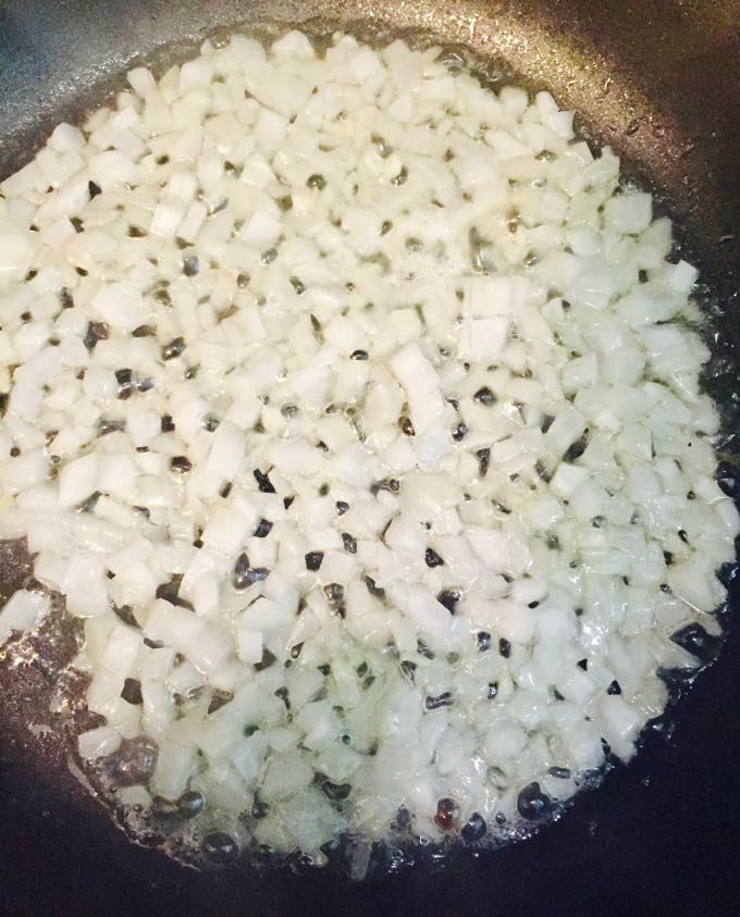 Cooking the onion for Easy Orzo Pilaf with Lemon and Chives