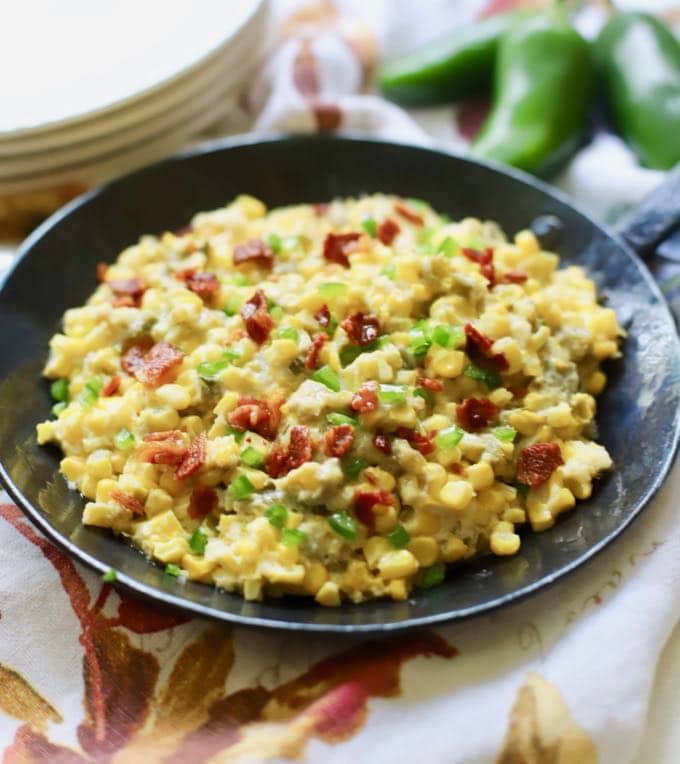 A small skillet of Southern Corn Casserole ready to serve.