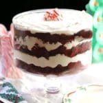 Christmas Red Velvet Cake Trifle with festive candy cane colors ready to serve in a trifle dish