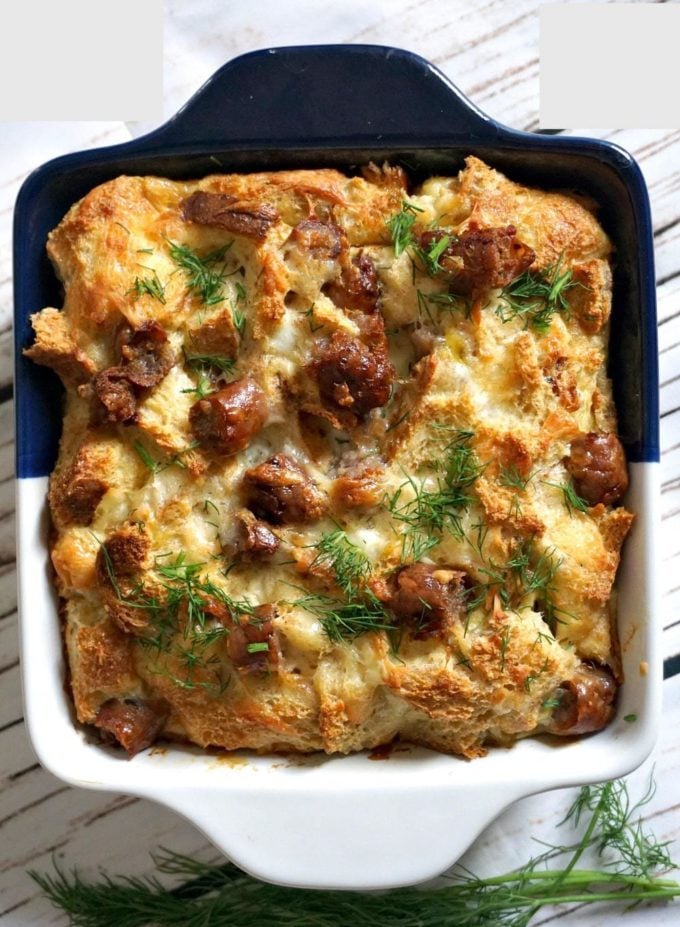 Make Ahead Sausage Breakfast Casserole in a black and white casserole dish. 