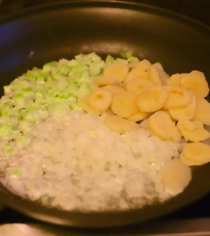 Celery, onions and water chestnuts cooking for Easy Chicken and Wild Rice Casserole