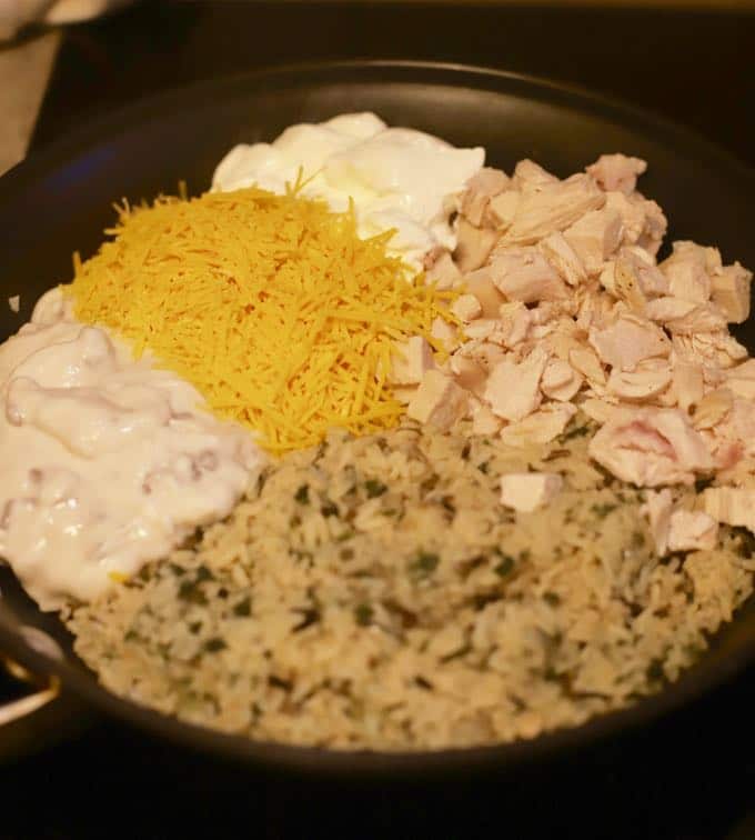 Mixing in chicken and rice for Easy Chicken and Wild Rice Casserole