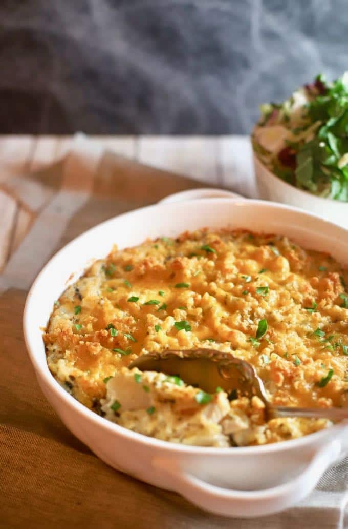 Easy Chicken and Wild Rice Casserole garnished with parsley and ready to serve